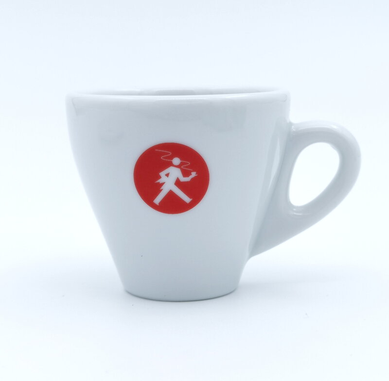 Taza de café expreso Olympia con platillo