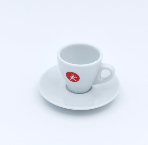 Taza de café expreso Olympia con platillo